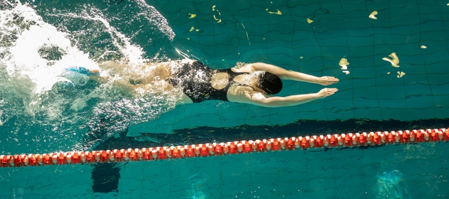 A person is swimming underwater